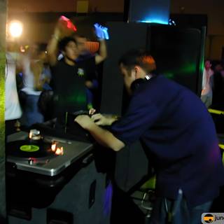 Nightclub DJ mixing beats