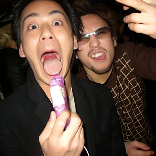 Two Men Enjoying Desserts at 2003 Nye Evo Osaka Event