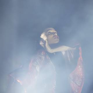Woman in Red Robe Performs Solo Dance in Smoke