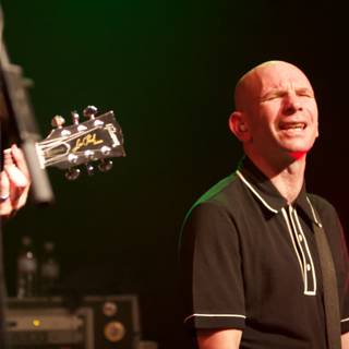 The Bald Musician's Electrifying Performance at the Bad Religion Glasshouse Concert