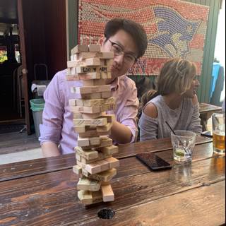 Tower of Blocks at a Wooden Table