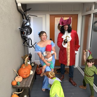 Family Peter Pan Halloween Costume Portrait on Front Porch