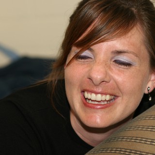 Joyful Woman Laughing on a Casual Evening