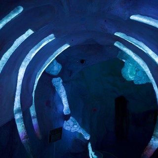 Immersive Blue Light Installation with Concentric Arcs