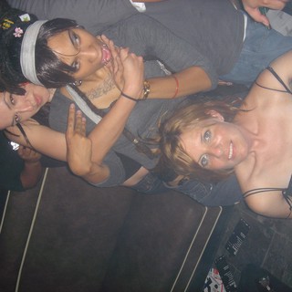 Three Friends Posing at a Nightclub in 2004