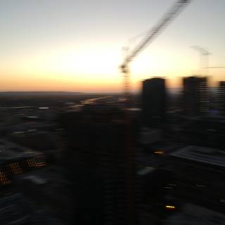 Blurred Metropolis Skyline at Sunset
