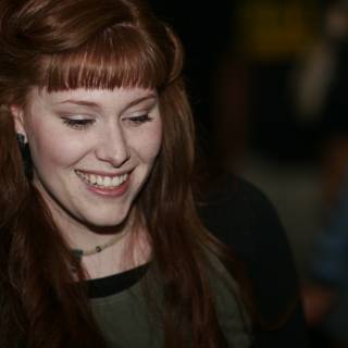 Red-headed Woman with a Contagious Smile