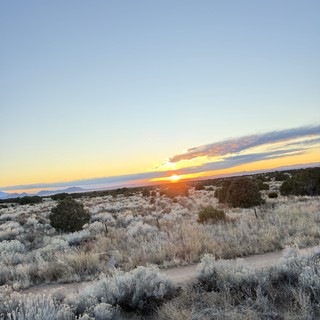 Desert Sunset Over Sagebrush Landscape in New Mexico