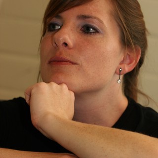 Thoughtful Young Woman in Contemplative Pose