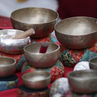 A Table Full of Metal Bowls