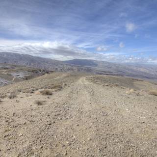 Lone Dirt Road in the Desert
