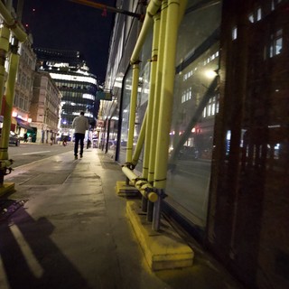 Yellow Scaffolding on London Street at Night