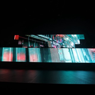 Cyberpunk Cityscape Projected Across Fragmented LED Panels