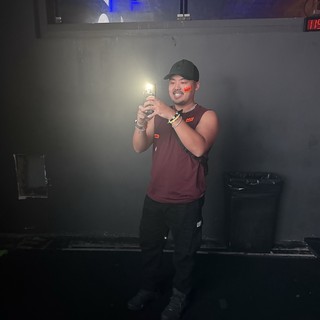 DJ Performer Captured Mid-Set at Electronic Music Venue