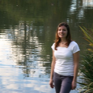 a-park-or-nature-reserve-with-a-reflective-pond-likely-in-the-united-states