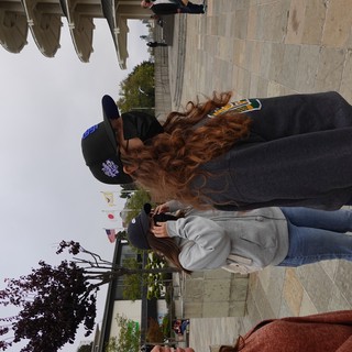 Masked Friends Taking Photos at Japanese Peace Plaza