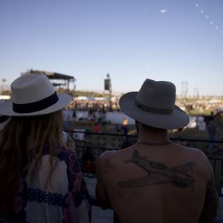 Tattooed and Hat-clad Music Lovers