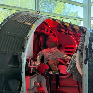Young Explorer in the Capsule