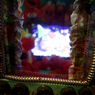 Illuminated Folk Art Display with Decorative Frame