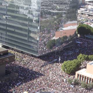 Massive Crowd Gathers in Urban Metropolis