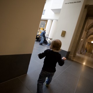 Young Child Exploring Museum Gallery Space