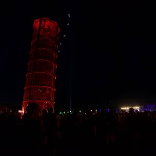Red-Lit Tower Amongst Urban Light