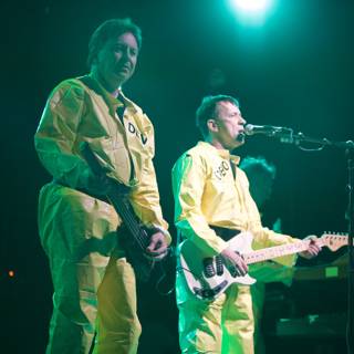 Yellow-Suited Men Rocking the Stage