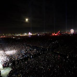 Under the Night Sky: A Concert Crowd Lights Up Coachella 2011 Album