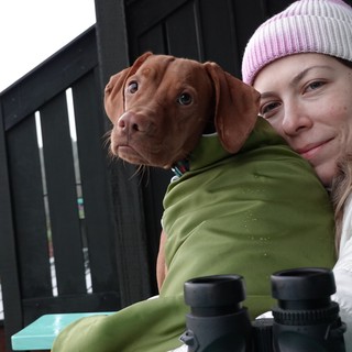 Woman and Dog Bundled Up Outdoors