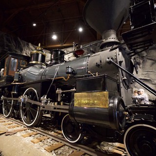 Historic Steam Locomotive on Display in Museum Setting