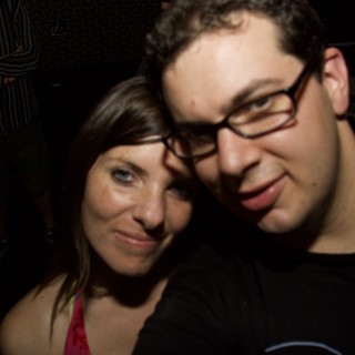 Two Friends Share a Moment at Late Night Party