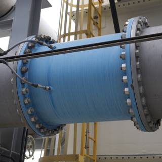 The Blue and Silver Spiral of a Factory Pipe