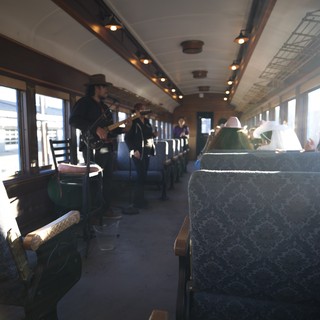 Musicians Performing on Vintage Train Journey
