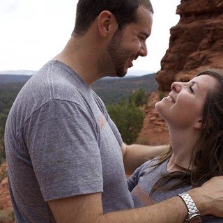 Laughing Couple Embracing at Sedona Red Rocks
