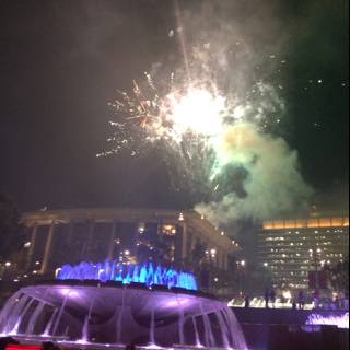 Fireworks Illuminating the Night Sky Above the Fountain