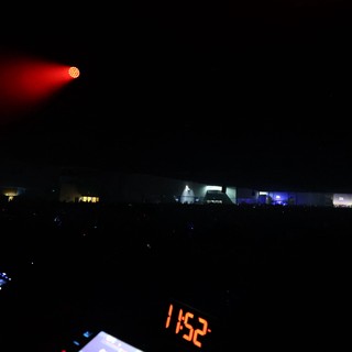Red Light Blazing Over Midnight Festival Crowd