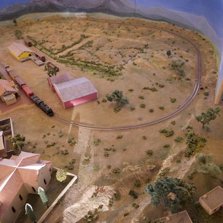 Desert Southwest Model Railway Layout with Mountain Backdrop