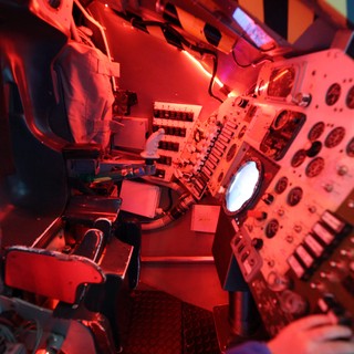Apollo Command Module Interior Bathed in Red Light