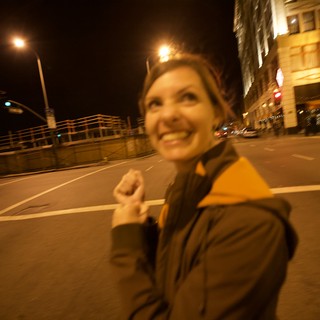 Joyful Celebration on Empty City Streets at Night