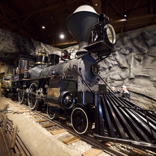 Vintage Steam Locomotive Display in Museum Cave Setting