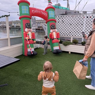Toddler Enjoying Christmas Display at Marina