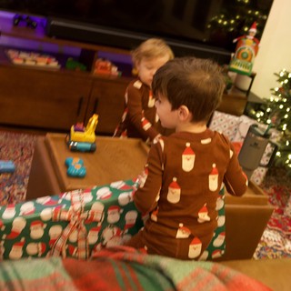 Christmas Morning with Children Opening Presents