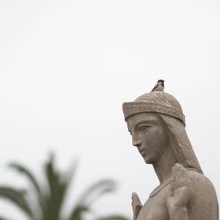 Bird-Topped Woman Statue
