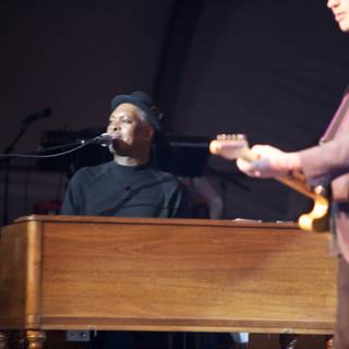 Jamming on Stage: Booker T. Jones and a Guitarist