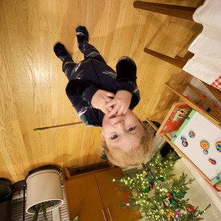 Child Playing on Christmas Morning at Home