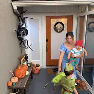 Halloween Porch Scene with Family in Costume