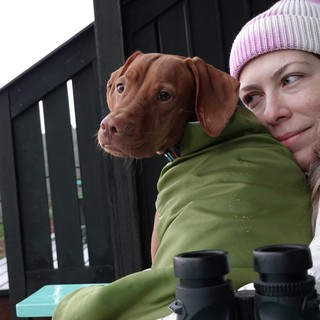 Woman and Dog Enjoying Outdoor Winter Moment