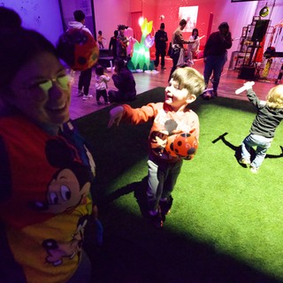 Children Dancing at Colorful Baby Rave Event