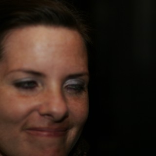 Candid Portrait of a Woman Smiling Softly