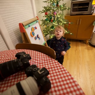 Child's Candid Moment During Christmas Morning Photography Setup